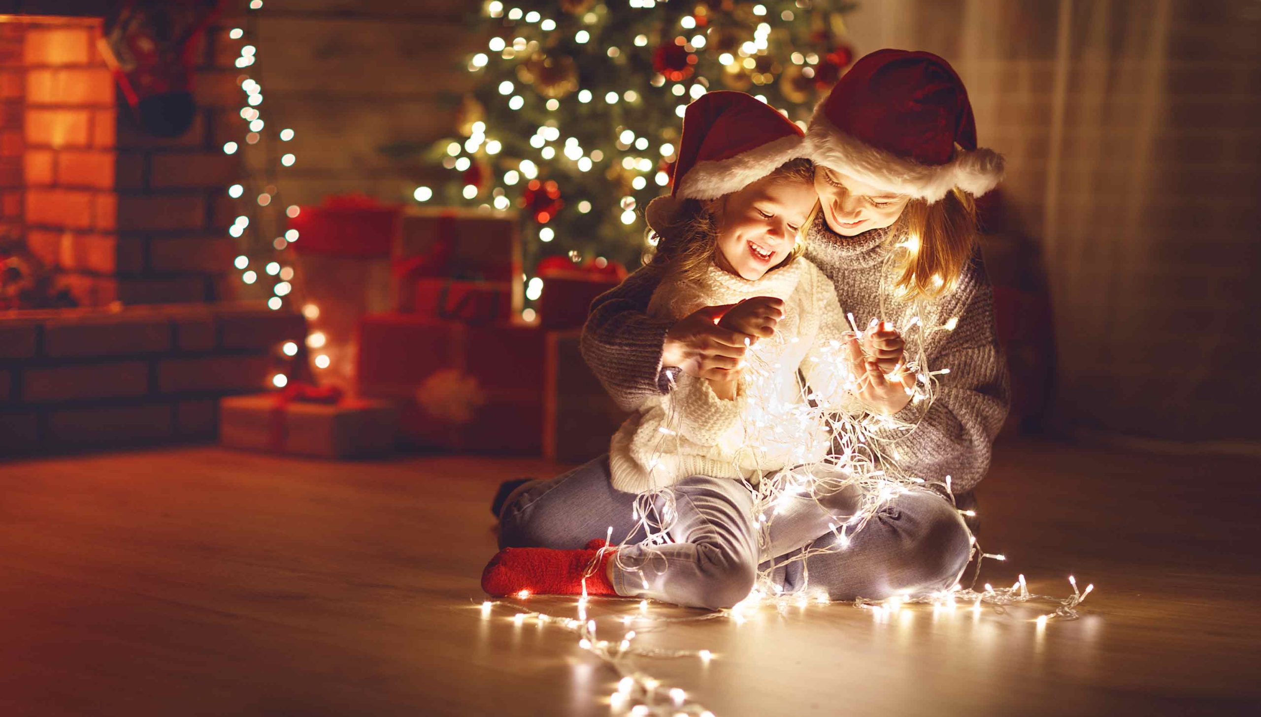 Mother and child in holiday cottage at Christmas