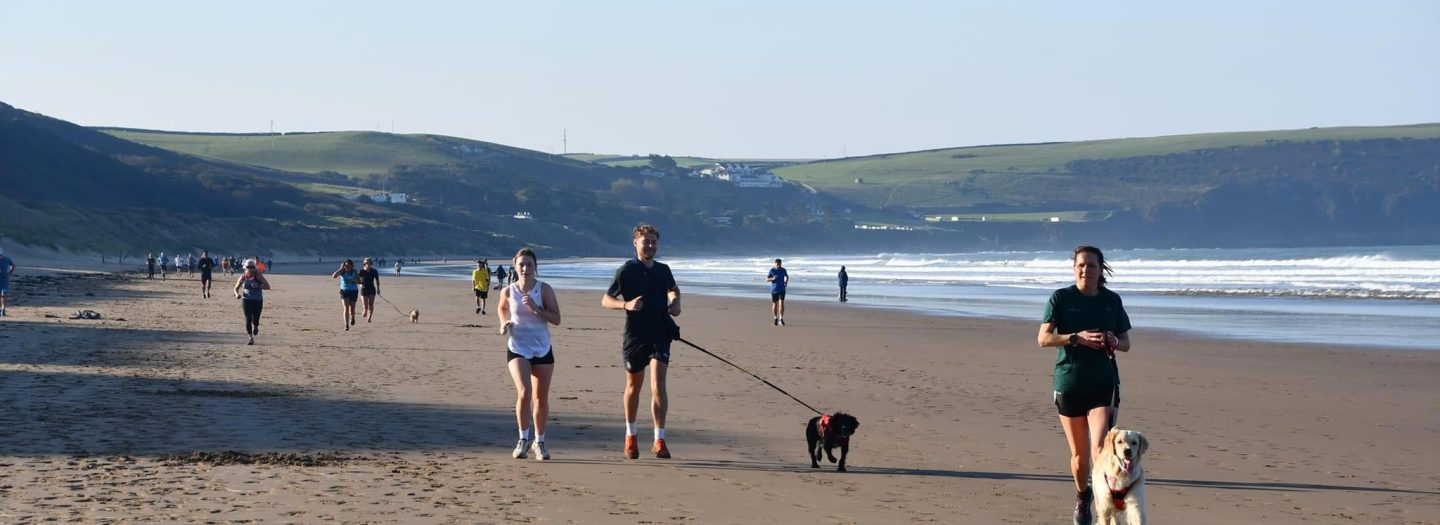 Runners on Woolaocmbe beach