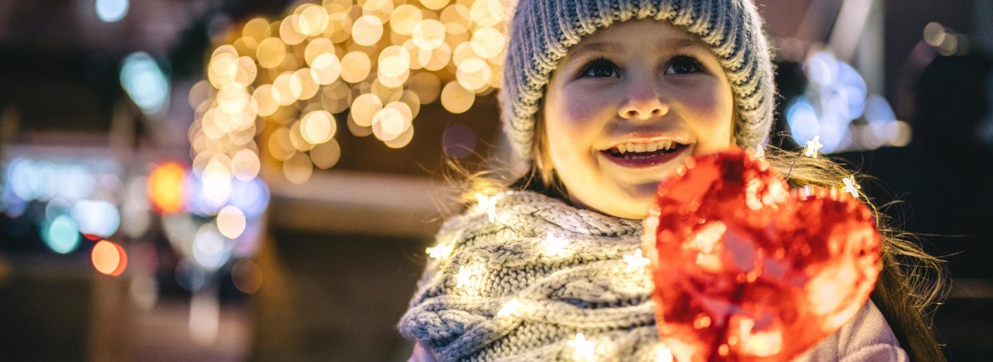 Girl watching Christmas lights