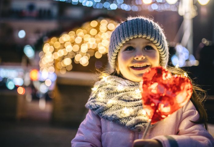 Girl watching Christmas lights