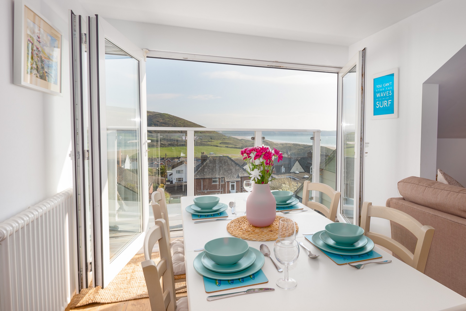 Dining table with sea view in the background